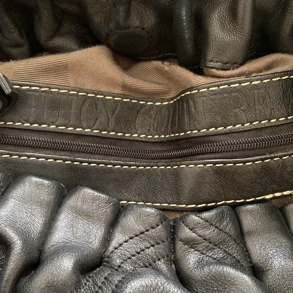 Juicy Couture quilted black shoulder hand bag with wide strap & inner po…